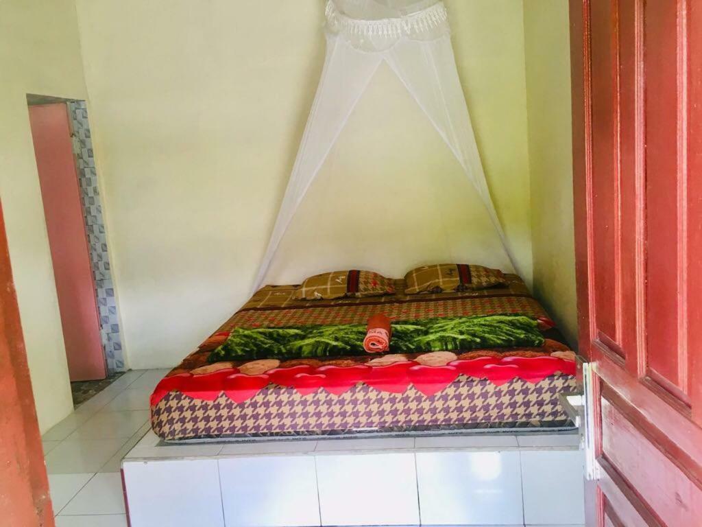 Sahnan Guest House Bukit Lawang Bagian luar foto