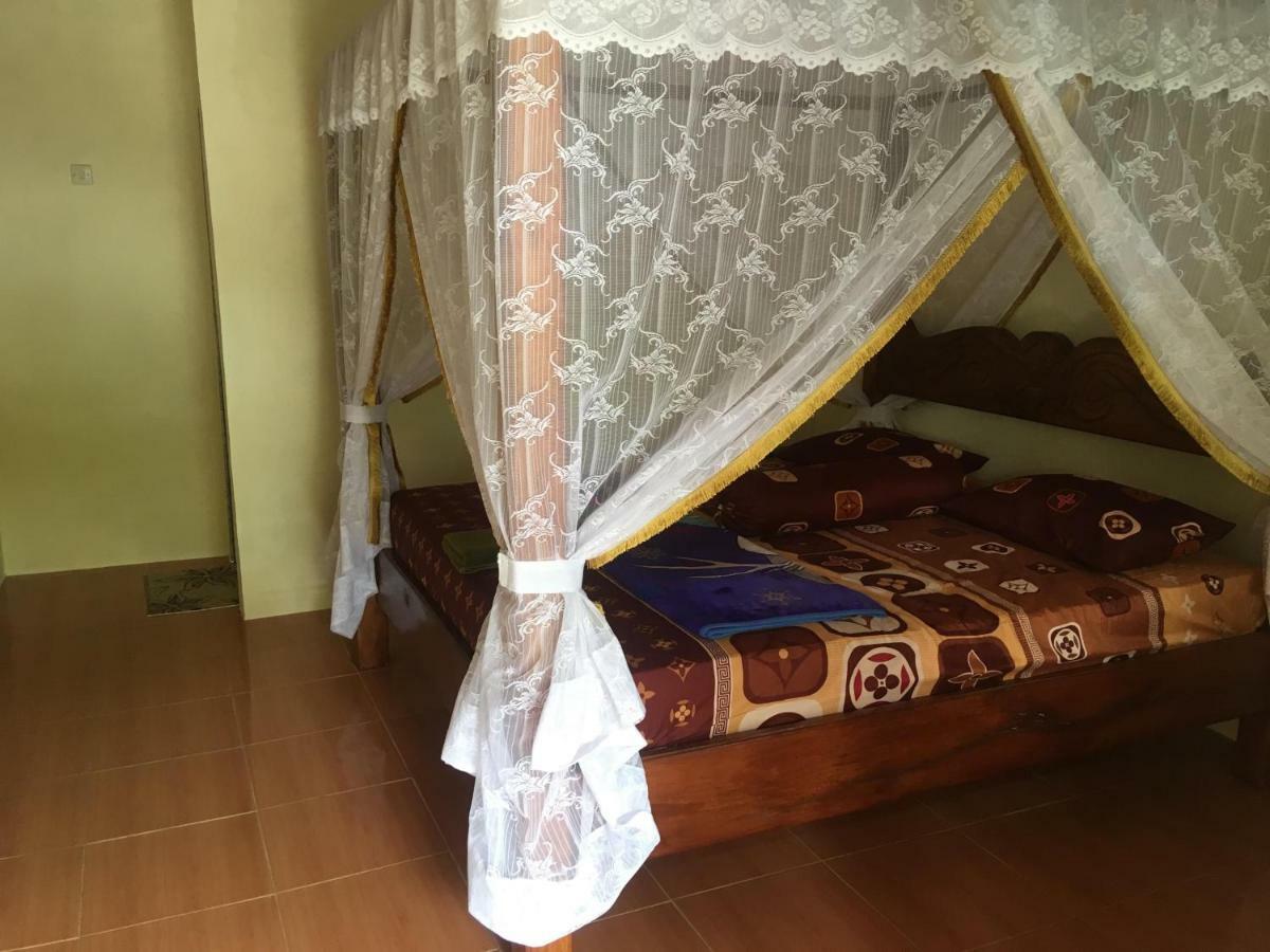 Sahnan Guest House Bukit Lawang Bagian luar foto