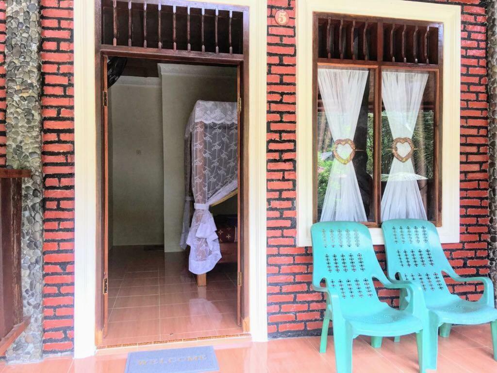 Sahnan Guest House Bukit Lawang Bagian luar foto