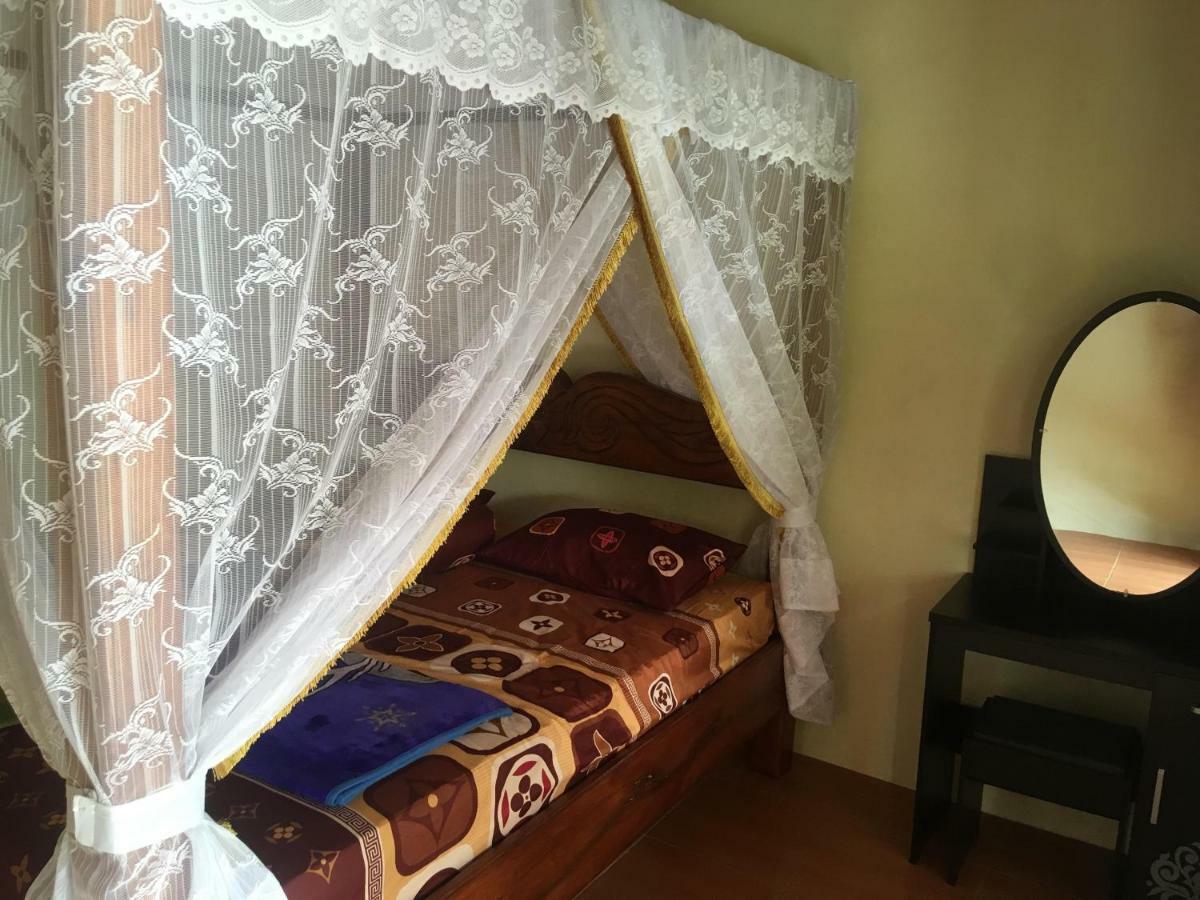 Sahnan Guest House Bukit Lawang Bagian luar foto